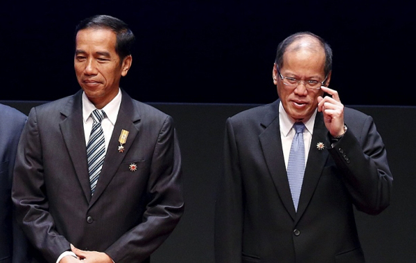 Indonesian President Joko Widodo at Pangulong Benigno Aquino III (photo credit: Reuters)